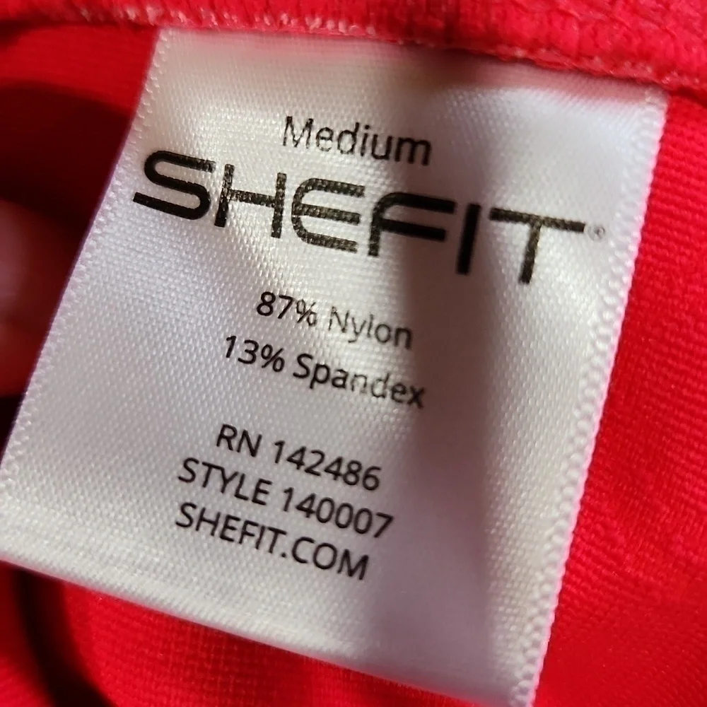 Shefit pocket leggings size medium bright fun fitness with scrunchis and laundry